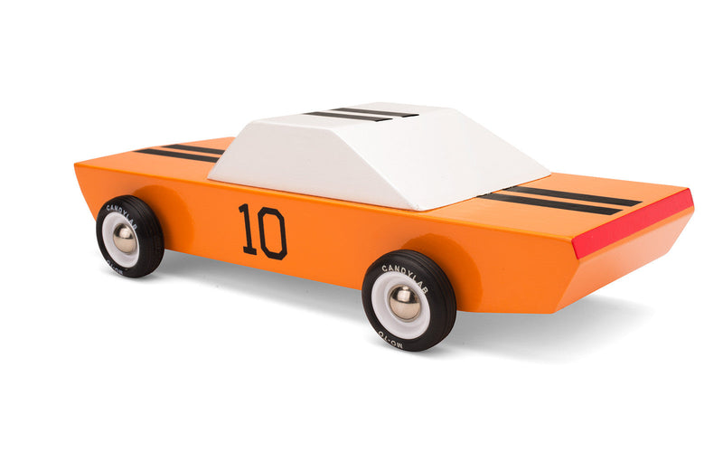 Captured at an angled view, the Plantoys GT-10 delivers sleek design perfect for fans of wooden toy cars.