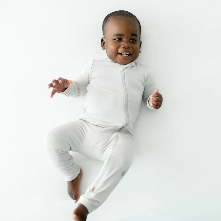 Kyte baby in the Oat Zipper Romper
