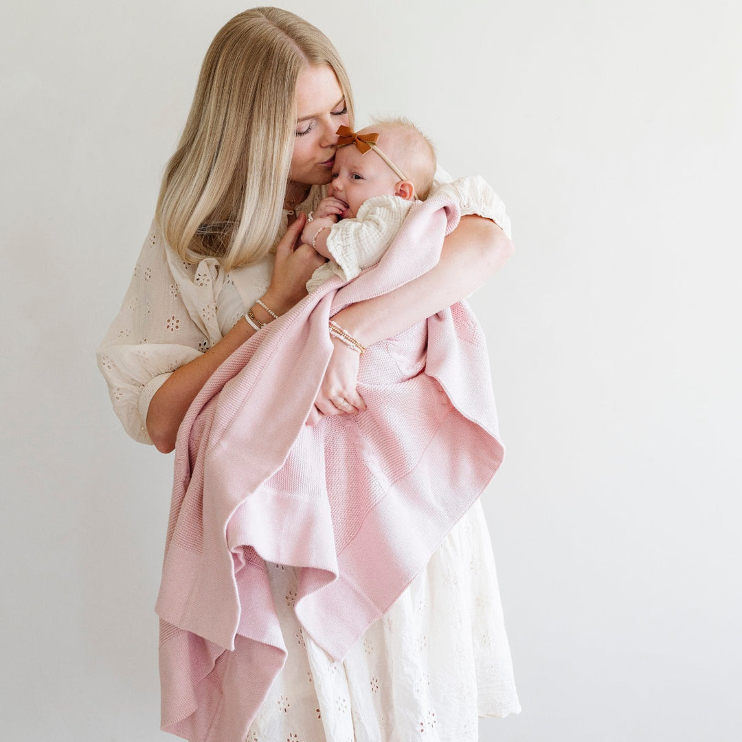 Pink Saranoni Heirloom Cotton Knit Receiving Blankets give a timeless knit look perfect for baby blankets nursery styling.
