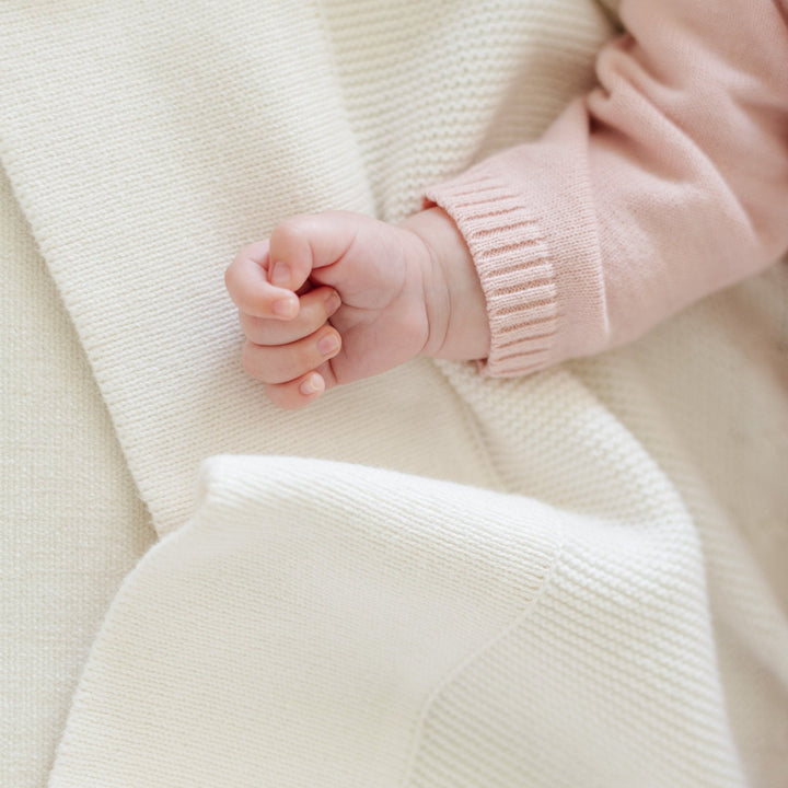 Crafted by Saranoni, the Heirloom Cotton Knit Receiving Blankets in Cream look timeless and make the best baby blanket option.