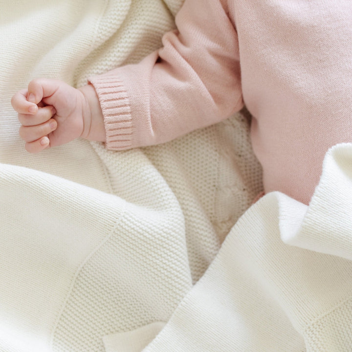 Add a touch of softness to your babyÕs day with the Pink Saranoni Heirloom Cotton Knit Set, crafted for gentle comfort.