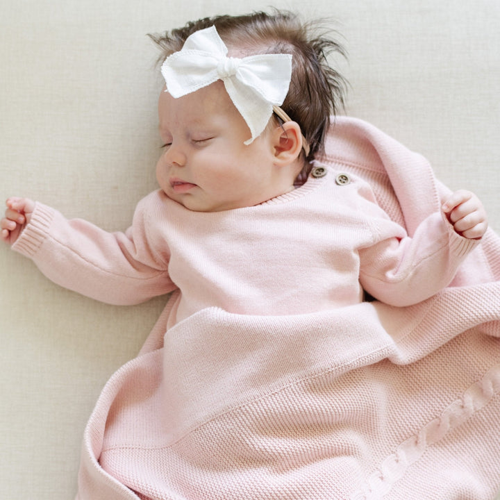 The Pink Saranoni Heirloom Cotton Knit Set makes dressing your baby girl both elegant and effortless.