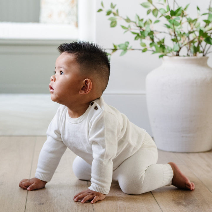 Wrap your little one in comfort with the Saranoni Heirloom Cotton Knit Set in Cream, a cozy favorite among the best baby clothes.