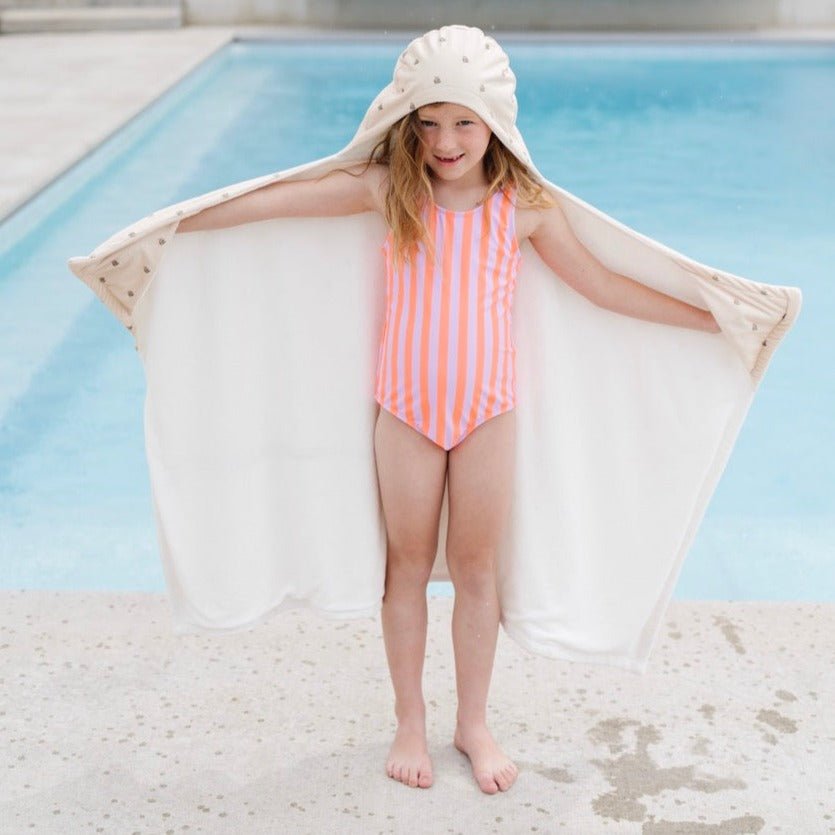 Soft and playful, Saranoni Hooded Towels in Tulips make perfect baby towels for bath or pool.