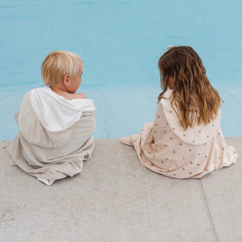 Wrap toddlers in comfort with Saranoni Hooded Towels in Tulip, an ideal hooded baby towel.