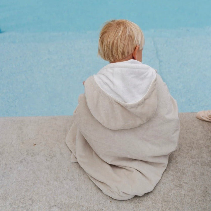 Saranoni Hooded Towels in Feather, a baby hooded towel perfect for pool, bath, or beach adventures.