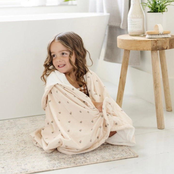 Softness meets function with Saranoni Hooded Towel in Tulips, hooded baby towel toddlers enjoy.