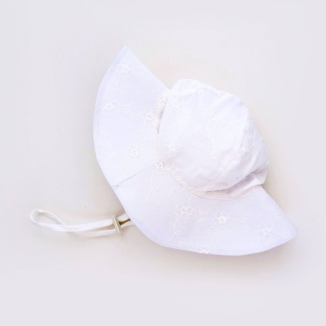 huggaluggs 50 upf white embordered flower patterned baby and todd;er sun hat 