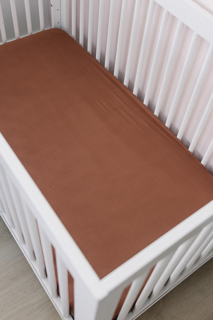 Rust Bamboo Crib Sheet by Mebie Baby breathable and stretchy crib sheet dimensions