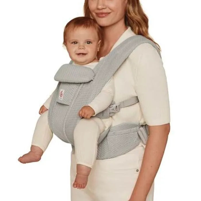 Supportive and stylish, the Ergobaby Omni Deluxe in Pearl Grey is a sleek baby carrier for daily wear.