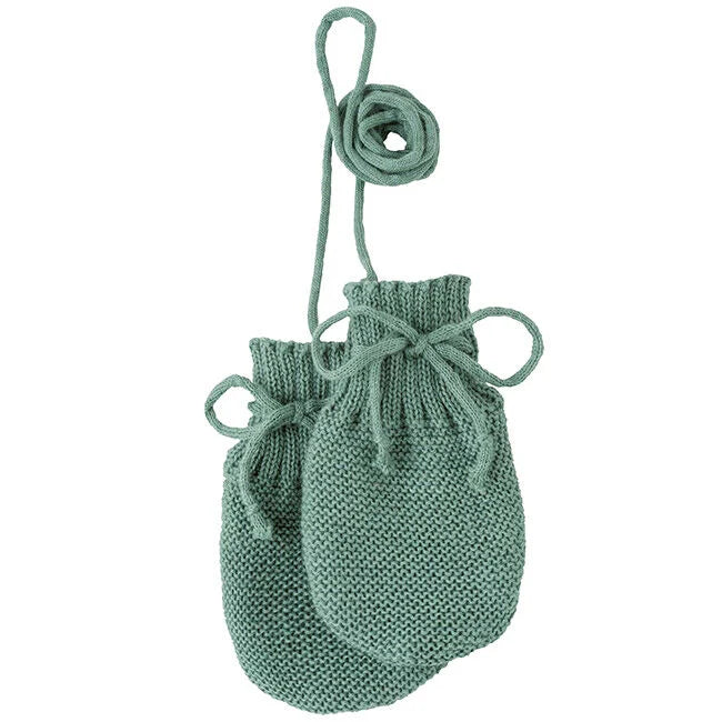 Sage green knitted mittens on a cord, the Jade shade of Disana Organic Merino Wool Baby Mittens, warm winter mitts for babies