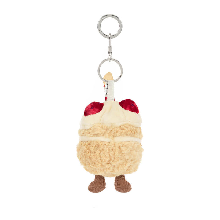 Back of Jellycat A4BCBC birthday cake bag charm -- soft sponge cake keychain, Jellycat food plush