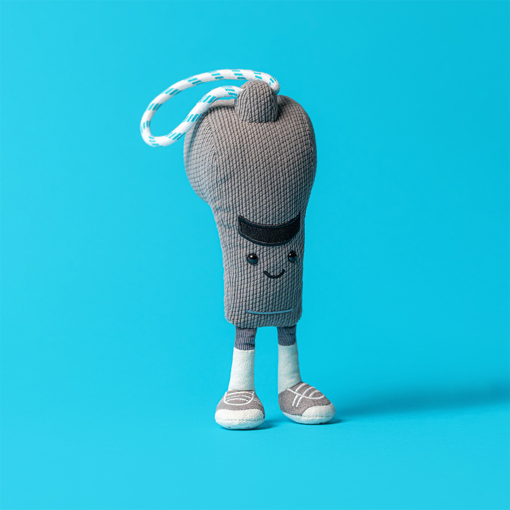 Walston Whistle by Jellycat standing on blue backdrop -- Amuseables Sports plush stuffed animal for sports fans