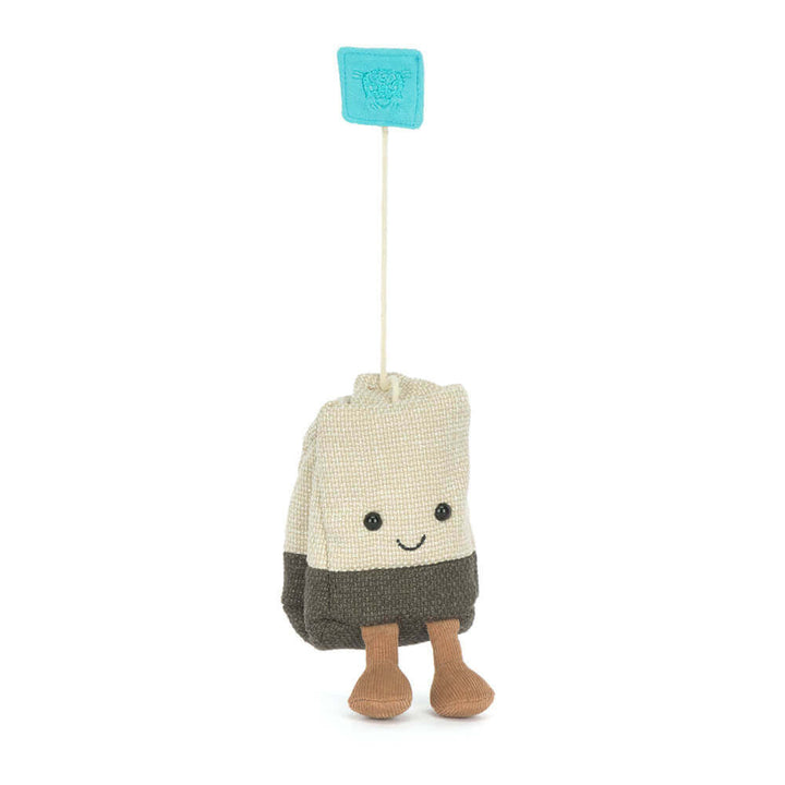 Jellycat Amuseables Steepy Tea Bag hanging by its tag string -- whimsical tea bag plush toy