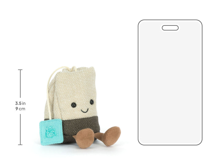 Size comparison: Jellycat Tea Bag plush next to phone, 4.3in Amuseables Steepy stuffed toy