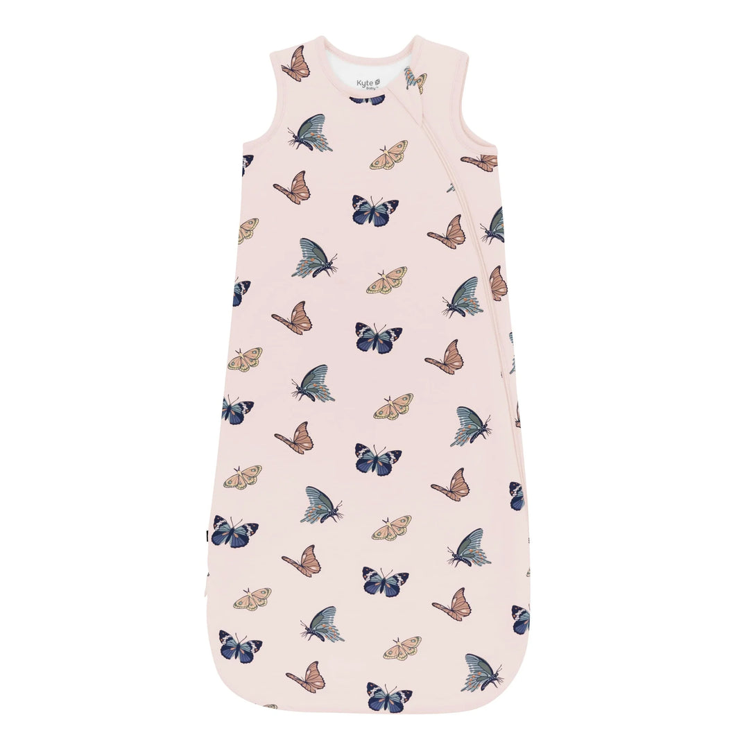Blush Butterfly florals highlight the Kyte Baby Sleep Sack Tog 1.0, a premium bamboo sleep sack