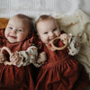 Twins with Mushie Teethers for Newborns
