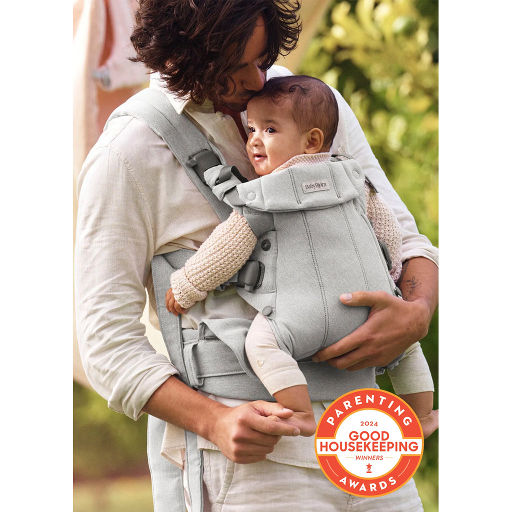 dad baby wearing with babybjorn carrier