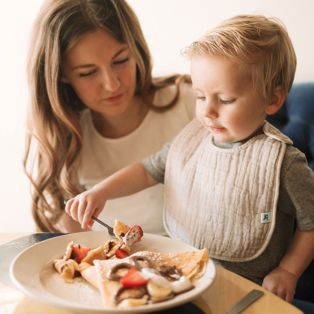Mealtime made easy with Little Unicorn Planetary 2 Bibs, soft bib for baby