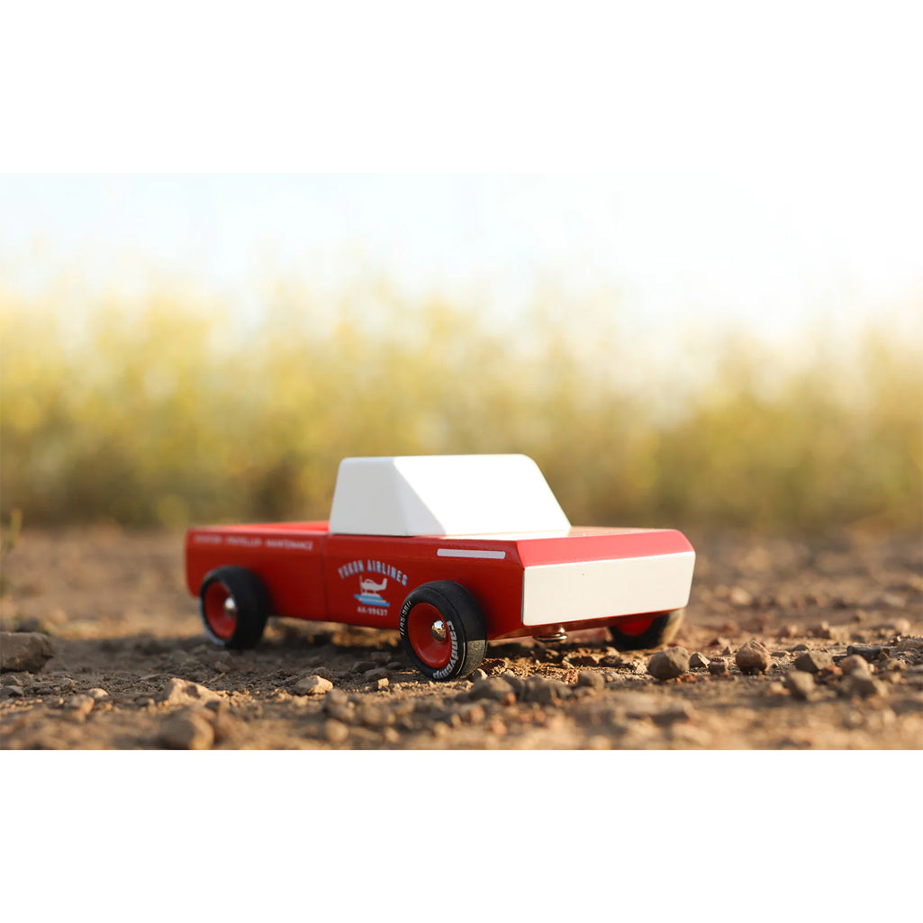 Candylab toy cars, featuring modern and vintage-inspired wooden designs.