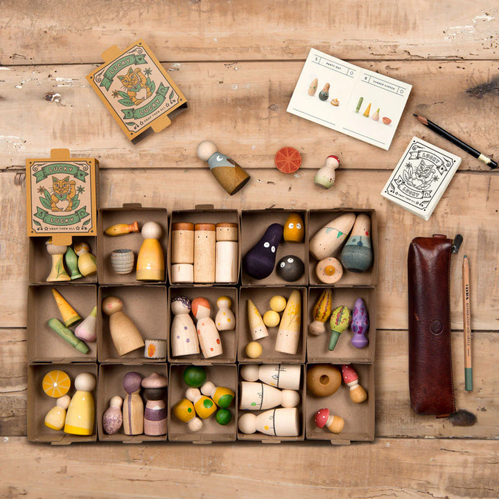 Grapat Lucky Lucky 3rd Edition in natural hues, a wooden toy promoting sensory engagement.