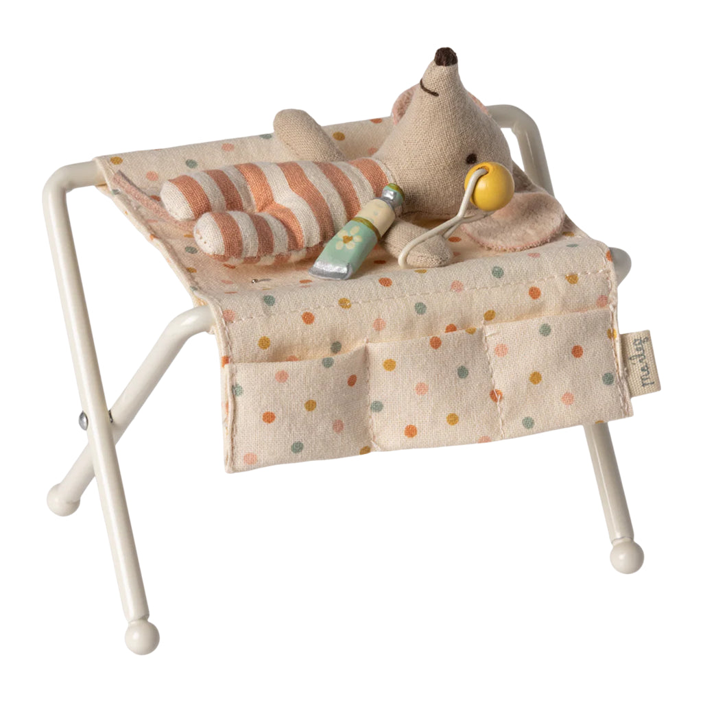 A close-up of the off-white Maileg Nursery Table, perfect for enhancing your Maileg dollhouse experience.