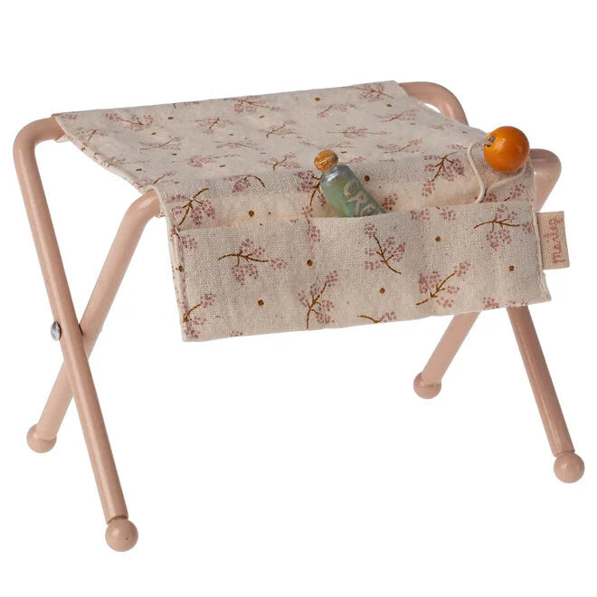The rose-colored Maileg Nursery Table blends beautifully with other dollhouse furniture and Maileg mice pieces.