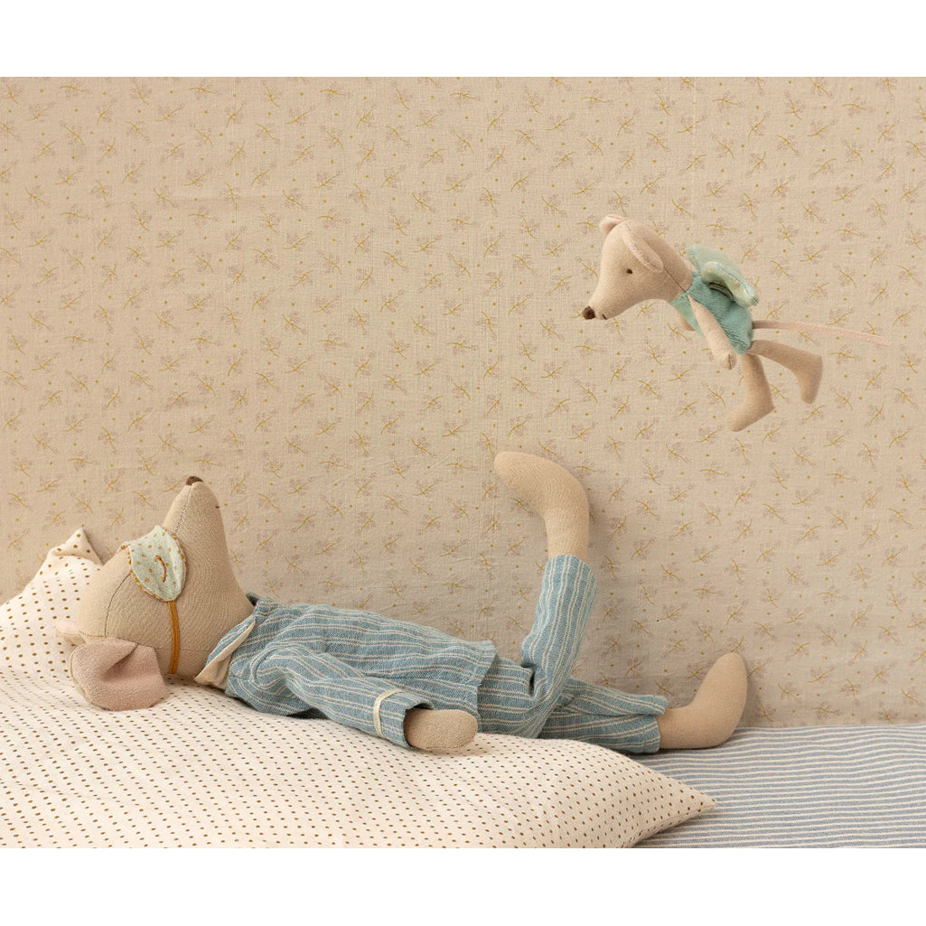 A soft and sweet pairing emerges with the Maileg Fairy Mouse posed near a stuffed doll.