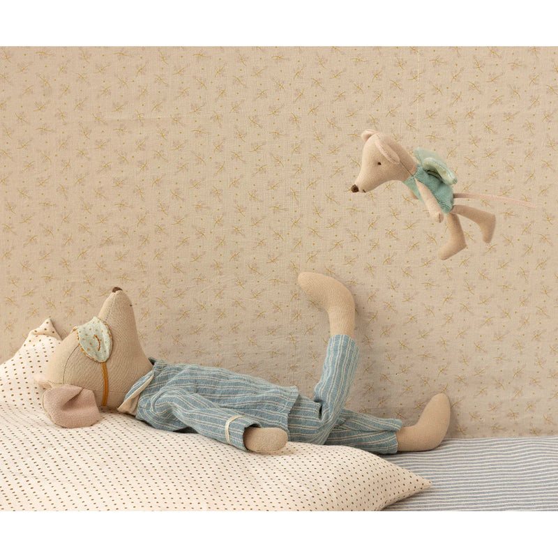 A soft and sweet pairing emerges with the Maileg Fairy Mouse posed near a stuffed doll.