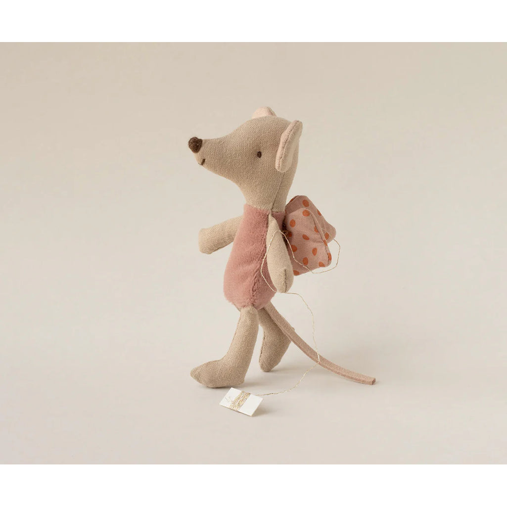 The Maileg Fairy Mouse stands ready for pretend play beside a favorite doll.
