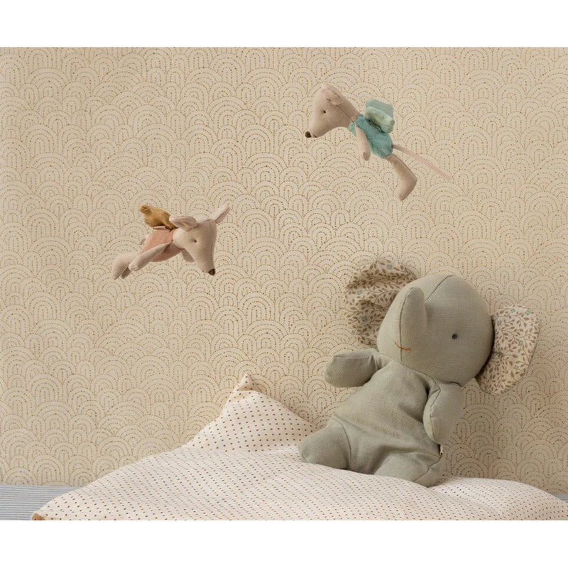 Inside a cozy Maileg mouse house, the Maileg Fairy Mouse adds a whimsical touch.