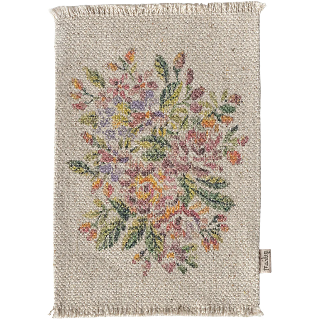 Enhance your dollhouse with the Maileg Miniature Rug in Flowers, a beautiful piece for dollhouse accessories collections.