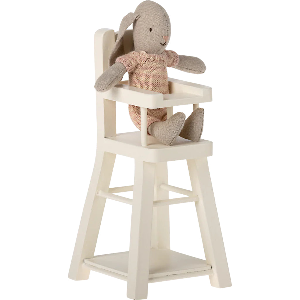 Styled for tiny homes, the Maileg Micro High Chair enhances a Maileg dollhouse interior.