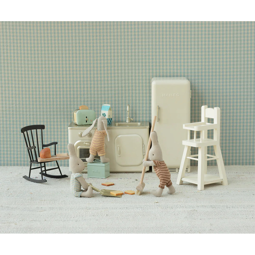 A detailed Maileg Micro High Chair perfect for Maileg mice and miniature play setups.
