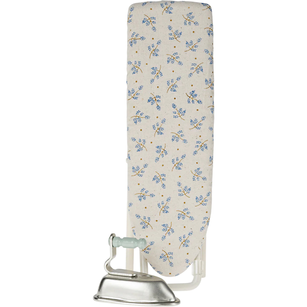 A cozy setup featuring the Maileg Miniature Iron and Ironing Board, perfect for dollhouse miniature styling.