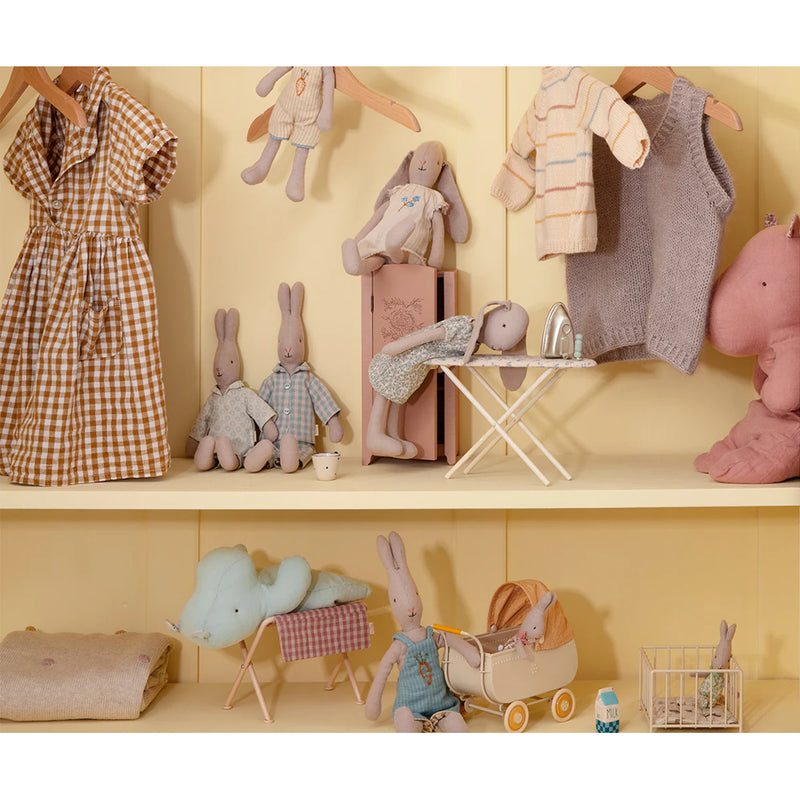 Styled neatly, the Maileg Miniature Iron and Ironing Board enhances any scene with dollhouse accessories charm.