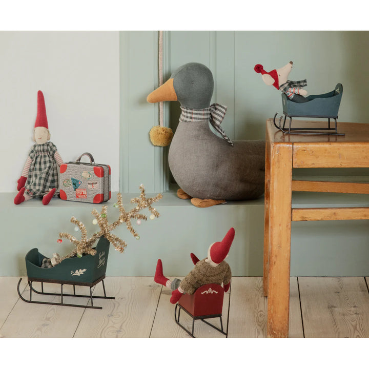 Add a whimsical touch to a Maileg dollhouse with the Miniature Sleigh accessory.