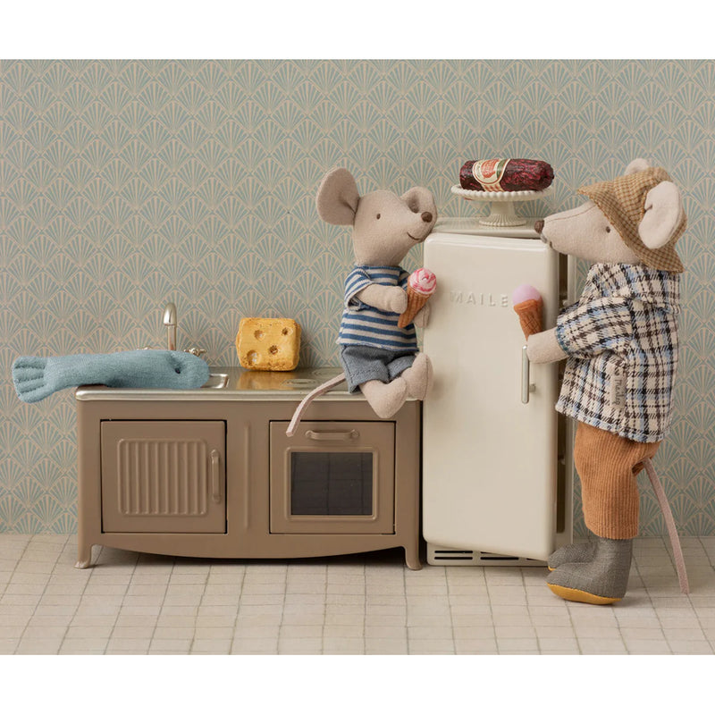 A delightful dollhouse accessory, the Maileg Mouse Fridge enhances tiny interior setups.