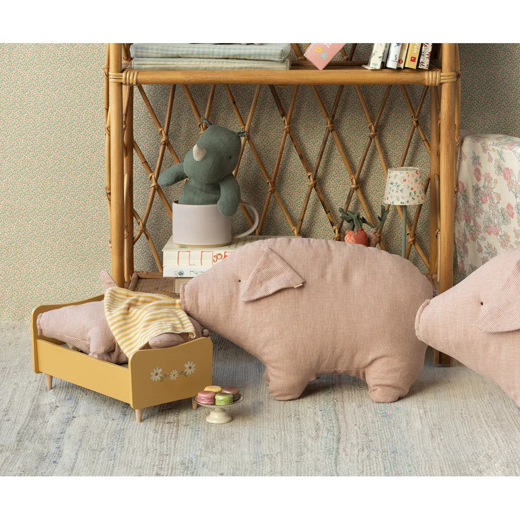 Capturing cozy charm, the Maileg Polly Pork piglet offers irresistible appeal for anyone collecting plush toys.