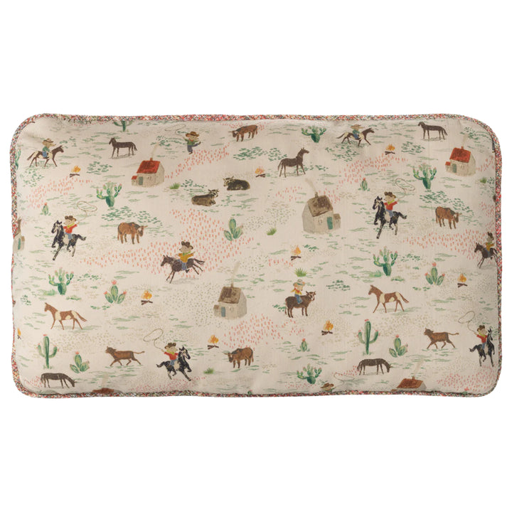 The Maileg Pony Cushion adds playful charm to any room, making it a cozy and stylish cushion choice.