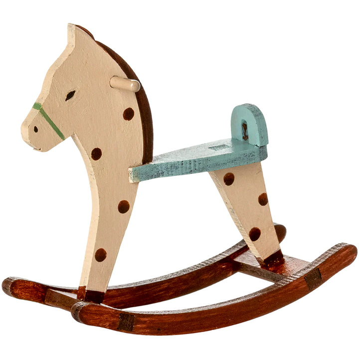 The Maileg Spotted Mouse Rocking Horse adds whimsy to any setup with its dollhouse miniature appeal.