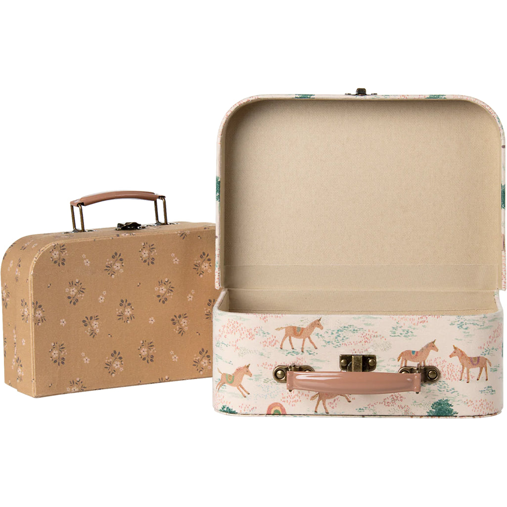 The Maileg Suitcase Set in unicorn print crafted for enchanting dollhouse accessories setups.