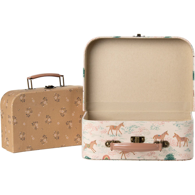 The Maileg Suitcase Set in unicorn print crafted for enchanting dollhouse accessories setups.