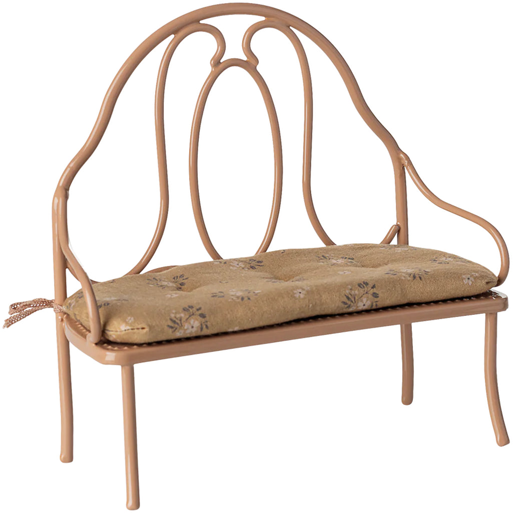 dark powder pink vintage metal maileg bench with yellow floral cushion 