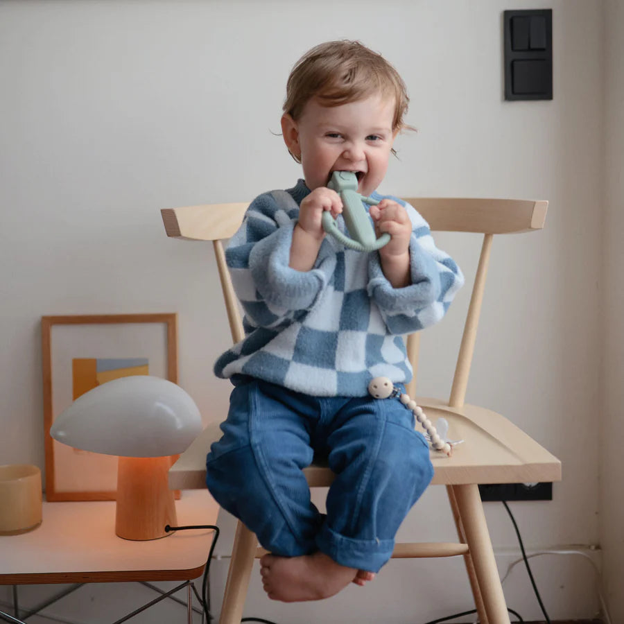 Mushie rattling robot teething toy to ease baby teething discomfort