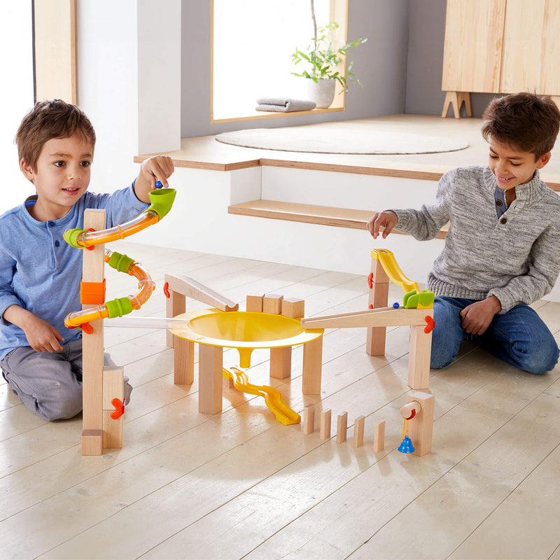 HABA Marble Run Funnel Jungle Starter Set lets toddlers build funnels, stack tracks, and enjoy Montessori play.