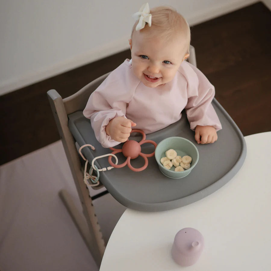 Mushie Placemats Splat Mat in Blush Another view of the blush-colored Mushie Splat placemat designed for mealtime messes