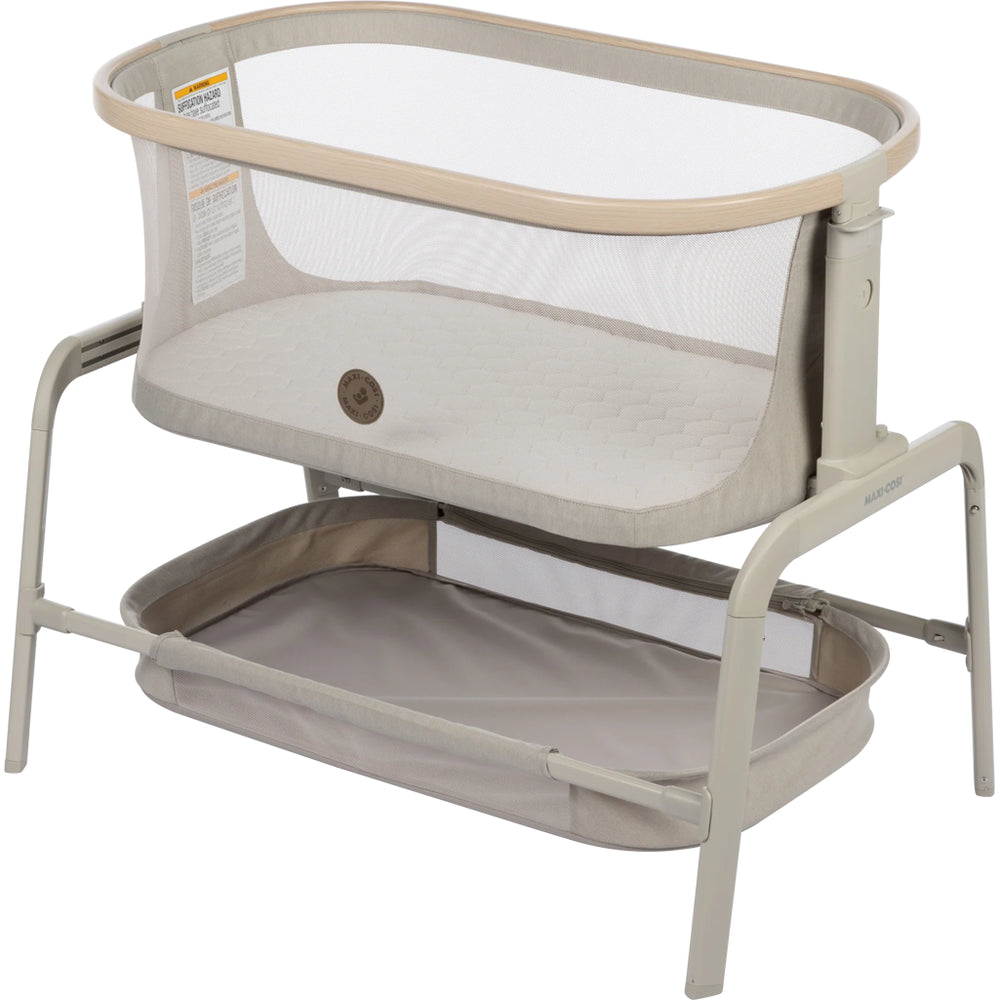 Maxi Cosi Iora 2-in-1 Bedside Bassinet in Blue, designed for comfort and convenience as a bedside bassinet.