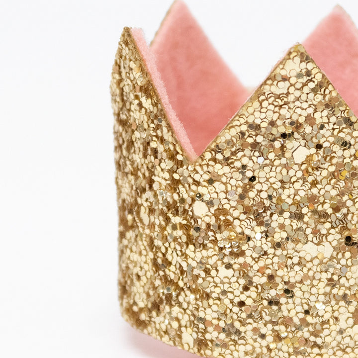 Gold glitter crown hair clip for girls by Meri Meri with pink felt lining
