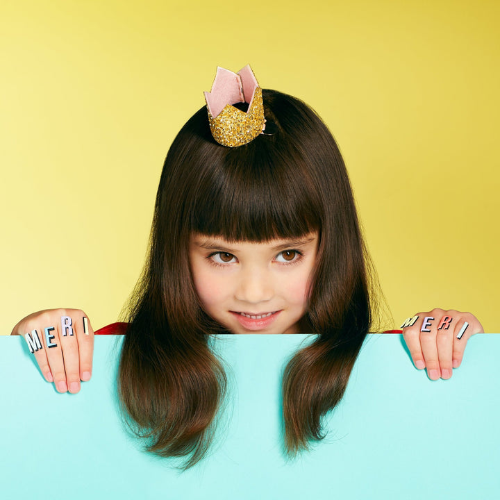 Kids crown barrette in gold glitter, the Meri Meri Mini Gold Glitter Crown Hair Clip